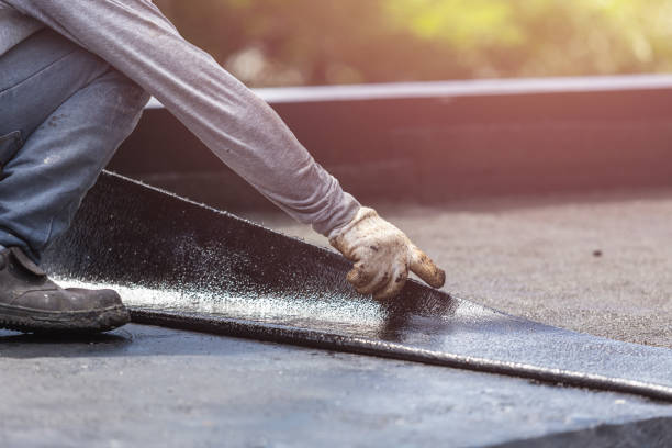 Professional Basement Waterproofing technician working in Fostoria, OH